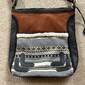 The Sak suede and leather purse with adorable tan accents and lots of pockets